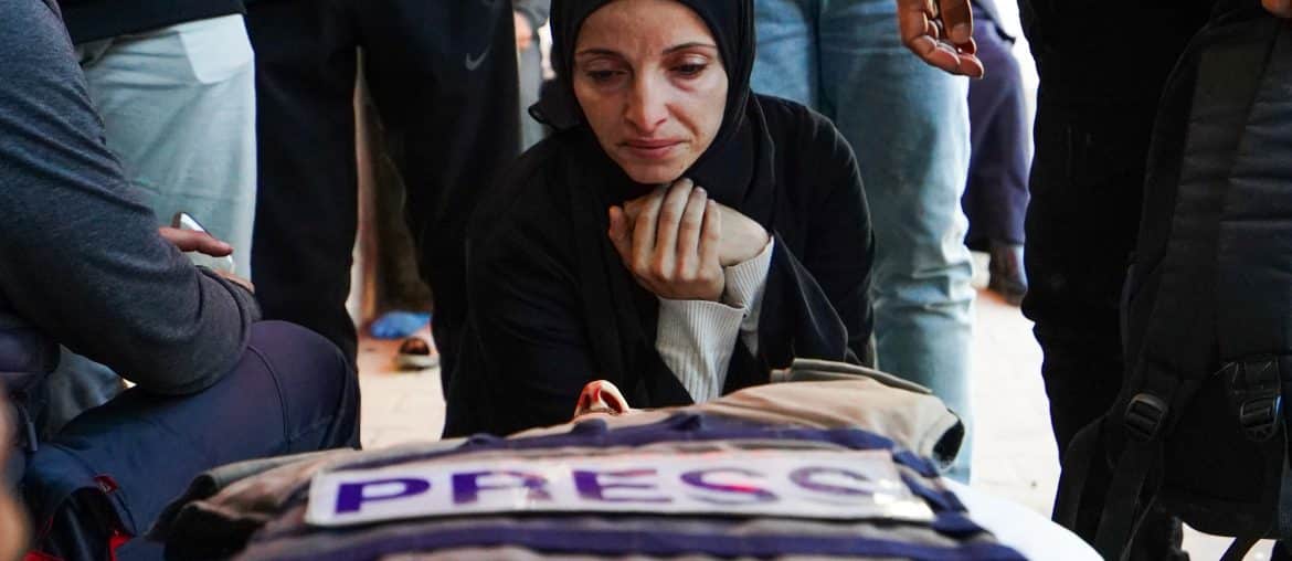 Mourners attend the funeral of Al Jazeera journalist Mohammad Weshah, who was killed in an Israeli strike on Wednesday, according to medics, at Al-Aqsa Martyrs Hospital in Deir al-Balah, central Gaza Strip, April 9, 2026. (Photo: Ramzi Abu Amer/APA Images)