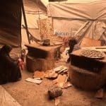 Palestinian women, including widows of people killed by the Israeli genocide in Gaza, prepare Maamoul biscuits before Eid al-Fitr in displacement camps, Nuseirat refugee camp, central Gaza, March 15, 2026. (Photo: Moiz Salhi/APA Images)