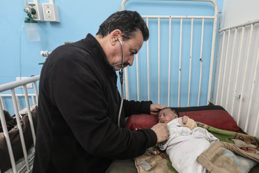 Newborn Adam al-Ustaz receives treatment at al-Rantisi Children's Hospital in Gaza City after being bitten by a rat inside a displacement tent, March 28, 2026. (Photo: Moiz Salhi/APA Images)