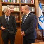 Naftali Bennett, right, and Yair Lapid, left, prepare to rotate the prime ministership during their first unity effort, on June 30, 2022. (Photo: Koby Gideon/Israel Gpo via ZUMA Press Wire/APA Images)