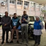 WHO workers leading a medical evacuation from Gaza on December 31, 2024. (Photo: Doaa el-Baz/APA Images)