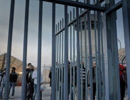 Palestinians in 2021 passing through Qalandia checkpoint on the way to work inside Israel. (Photo: Qassam Muaddi/Mondoweiss)