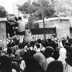 Iranian students climb up U.S. embassy gates in Tehran, on November 4, 1979. (Photo: Wikimedia/revolution.shirazu.ac.ir)