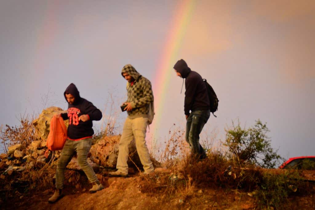 Workers in 2021 coming home from jobs behind the Green Line crossing through the Ni'lin checkpoint into the West Bank. (Photo: Qassam Muaddi/Mondoweiss)