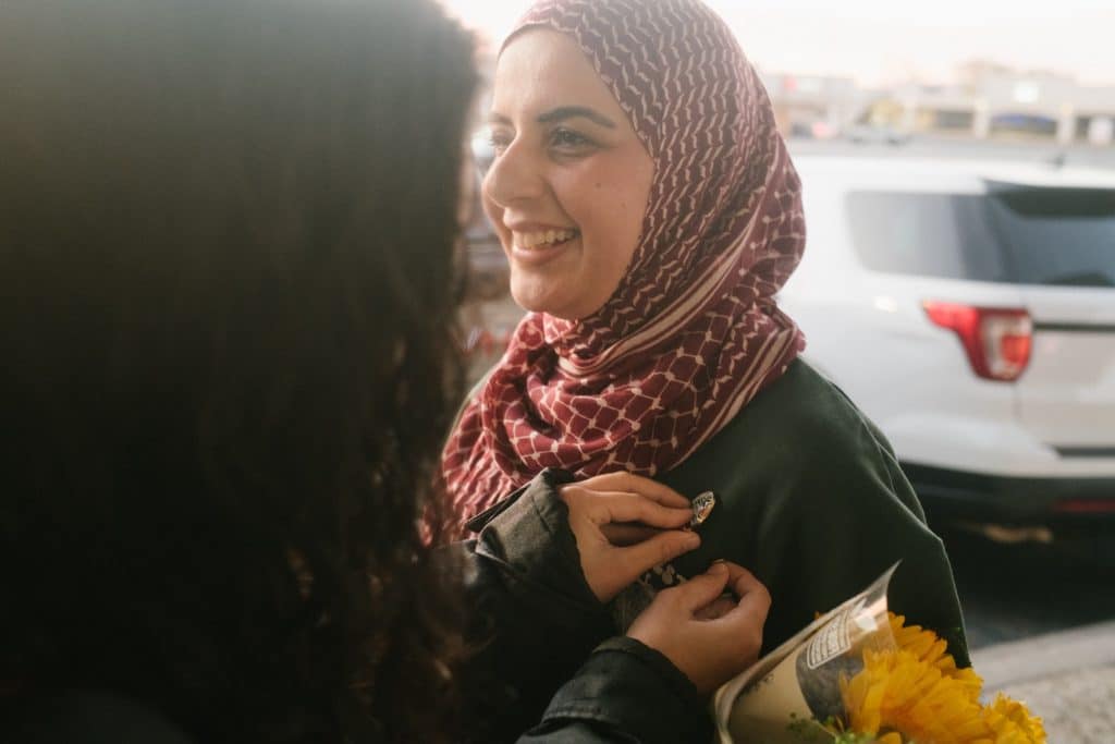 PYM Dallas members welcome Leqaa Kordia following her release. (Photo: Stephanie Drenka)
