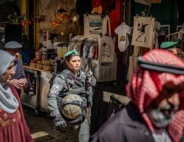 An Israeli soldier walks among Muslim worshippers in the Old City on the last Friday of the holy month of Ramadan, April 5, 2024. (Photo: © Ilia Yefimovich/dpa via ZUMA Press/APA Images)