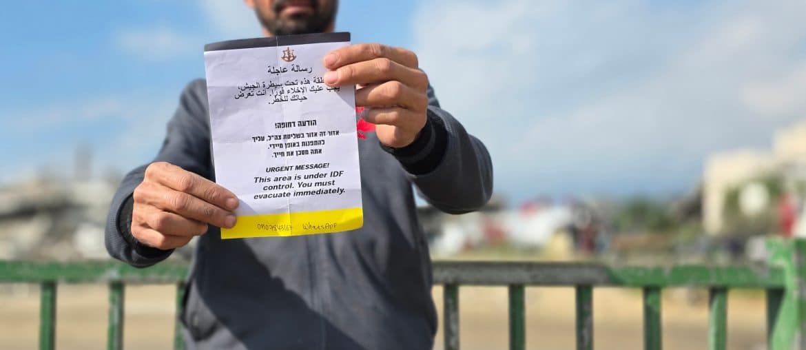 Israeli forces demolish a house near the "Yellow Line," dropping leaflets for residents to leave the al-Raqab al-Gharbi neighborhood, adjacent to Salah al-Din Street in the town of Bani Suheila, east of Khan Younis in the southern Gaza Strip, January 19, 2026. (Photo: Tariq Mohammad/APA Images)