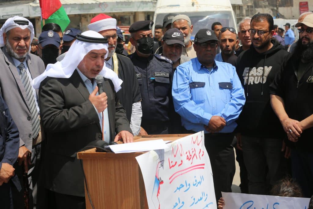 The National Gathering of Palestinian Tribes, Clans, and Families organized a demonstration in Gaza protesting the Israeli army's ongoing targeting of Palestinian police officers, Gaza City, April 19, 2026. (Photo: Anas Nour/APA Images)