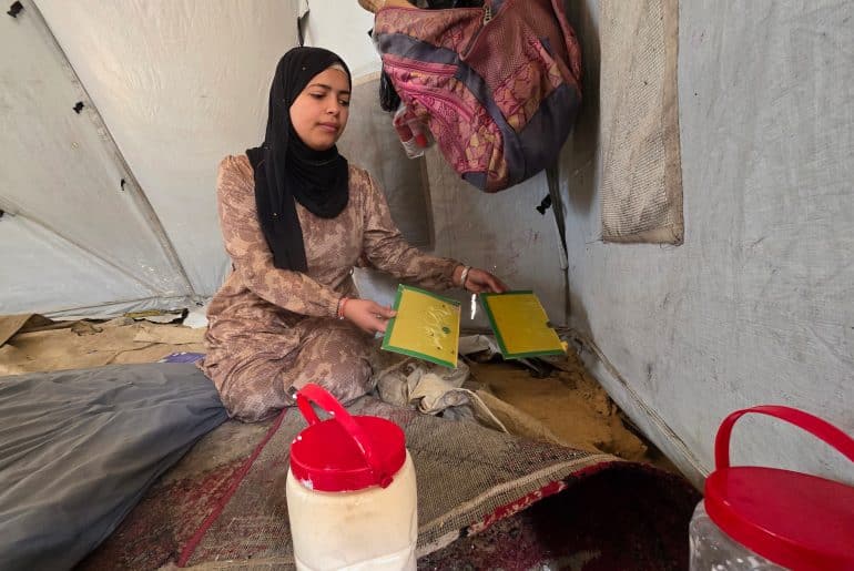 Days before her wedding, Amani Abu Salma was shocked to find her belongings eaten through by rodents inside her tent, April 19, 2026. (Photo: Tariq Mohammad/APA Images)