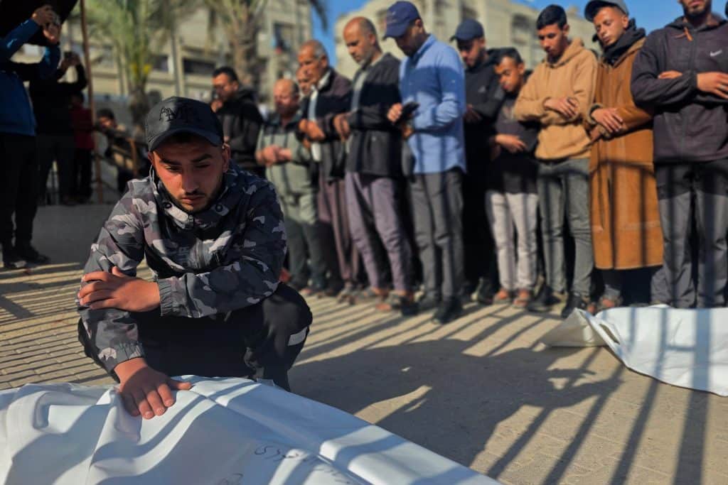 Palestinians bid farewell to the bodies of eight Palestinians killed in an Israeli strike targeting a police vehicle in the Mawasi area of Khan Younis, southern Gaza Strip, April 25, 2026. (Photo: Tariq Mohammad/APA Images)