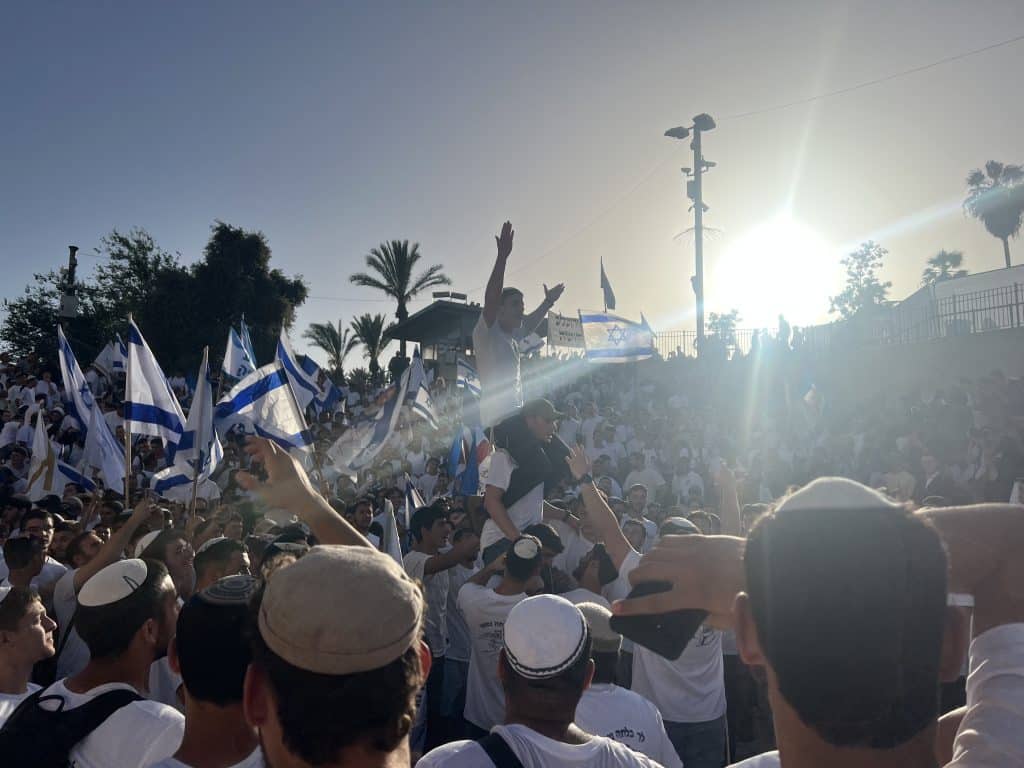 Gangs of extremist settler youth gather in front of Jerusalem's Damascus Gate, chanting “Death to Arabs” and “May your village burn”, as heavily armed police officers watched on, on May 15, 2026. (Photo: Jared Hillel/Mondoweiss)