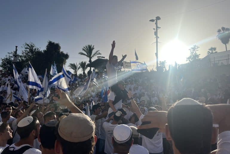 Gangs of extremist settler youth gather in front of Jerusalem's Damascus Gate, chanting “Death to Arabs” and “May your village burn”, as heavily armed police officers watched on, on May 15, 2026. (Photo: Jared Hillel/Mondoweiss)