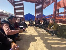 susan abulhawa, right, meeting with writers in Gaza in early 2024 for workshops that led to the book, "Every Moment Is A Life."