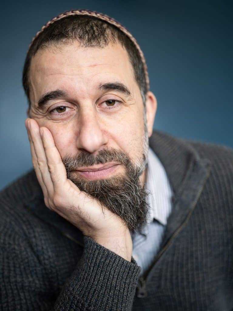 Michael Margolin, a Rabbi in training and spiritual leader at Tikkun v'Or Reform Temple poses for a portrait on Dec. 11, 2025, at his home in Ithaca, NY. (Photo: Caleb Kaufman)