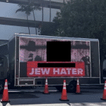 A redacted photo of a billboard truck allegedly hired by Miami Beach city commissioner David Suarez, submitted as an exhibit in a lawsuit filed by Jewish Voice for Peace of South Florida. (Screenshot: U.S. District Court, Southern District of Florida)