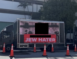 A redacted photo of a billboard truck allegedly hired by Miami Beach city commissioner David Suarez, submitted as an exhibit in a lawsuit filed by Jewish Voice for Peace of South Florida. (Screenshot: U.S. District Court, Southern District of Florida)