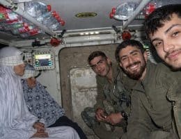 Israeli soldiers take a selfie with two detained Palestinians from Gaza, Aisha al-Aqqad, 78, and her daughter Huda, 41, during the Israeli ground invasion of Khan Younis in December 2023. The photo recently surfaced on social media. (Photo: Social Media)