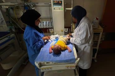 Patients receive treatment at Al-Aqsa Martyrs Hospital in Deir al-Balah, central Gaza, amid critical shortages in fuel and medical supplies, June 3, 2026. (Photo: Youssef Abu Watfa/APA Images)