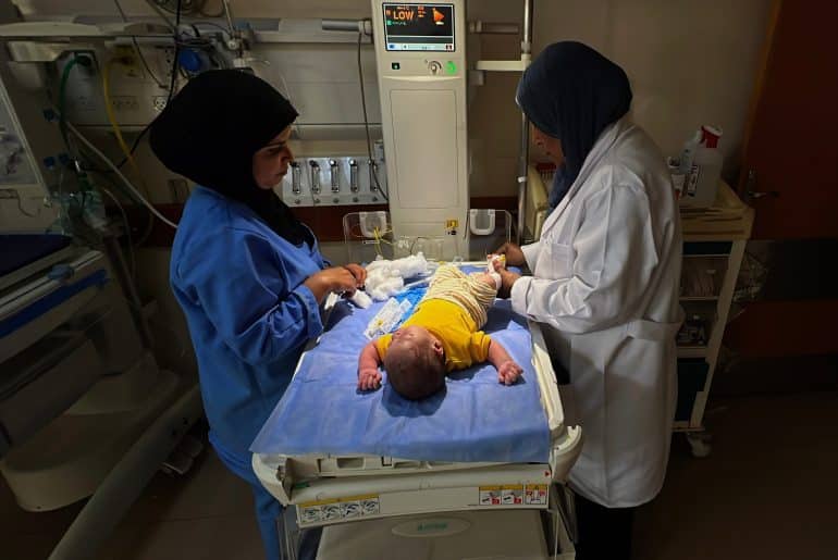 Patients receive treatment at Al-Aqsa Martyrs Hospital in Deir al-Balah, central Gaza, amid critical shortages in fuel and medical supplies, June 3, 2026. (Photo: Youssef Abu Watfa/APA Images)