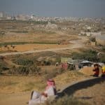 Destroyed buildings and damaged farmland are seen following the Israeli war in Nuseirat, central Gaza, May 14, 2026. (Photo: Hassan Jedi/APA Images)