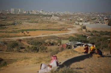 Destroyed buildings and damaged farmland are seen following the Israeli war in Nuseirat, central Gaza, May 14, 2026. (Photo: Hassan Jedi/APA Images)