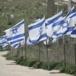 Israeli flags planted near an archaeological site in the Palestinian town of Sebastia, west of Nablus, February 20, 2026. (Photo: Mohammed Nasser/APA Images))