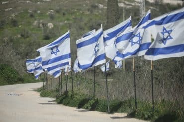 Israeli flags planted near an archaeological site in the Palestinian town of Sebastia, west of Nablus, February 20, 2026. (Photo: Mohammed Nasser/APA Images))