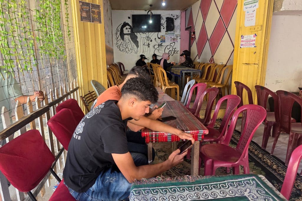 Palestinian students take their electronic General Secondary Education Certificate Examination (Tawjihi) at a café in Khan Younis, southern Gaza, on June 20, 2026. (Photo: Tariq Mohammad/APA Images)