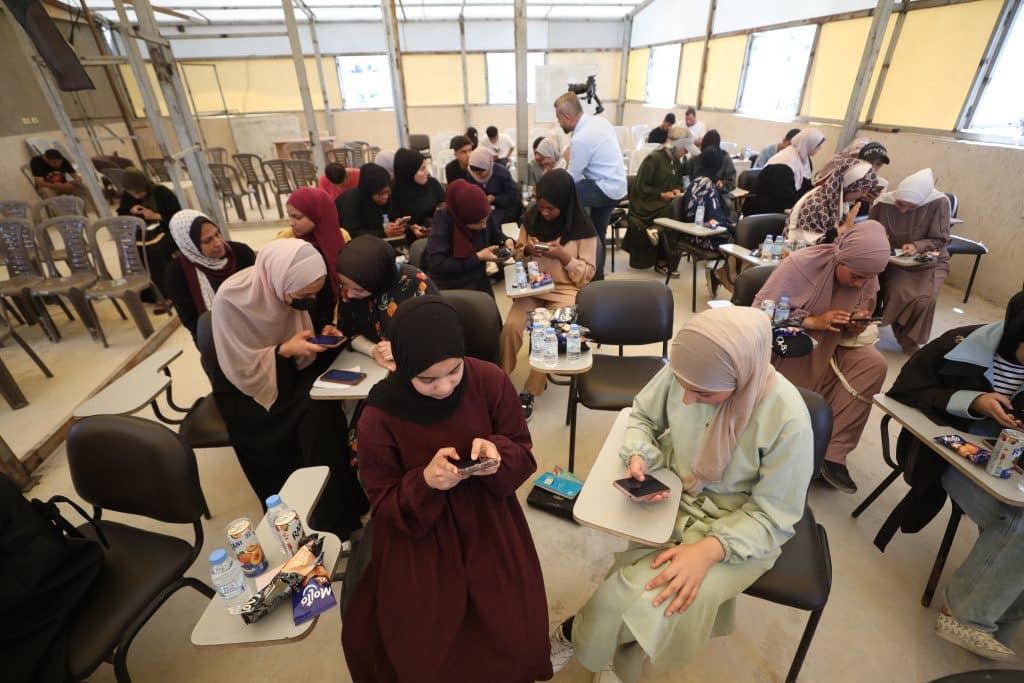 Palestinian students sit for the General Secondary Education Certificate Examination (Tawjihi) at an examination hall in the Gaza Strip, June 20, 2026. (Photo: Hassan Jedi/APA Images)