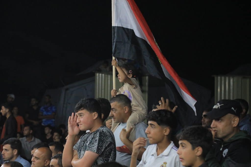 The Egyptian Relief Committee organized a rare public screening of the World Cup match between Egypt and Beligum, providing electricity, screens, and an internet connection, June 15, 2026. (Photo: Mazen Breem)