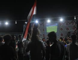The Egyptian Relief Committee organized a rare public screening of the World Cup match between Egypt and Beligum, providing electricity, screens, and an internet connection, June 15, 2026. (Photo: Mazen Breem)