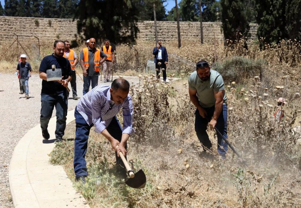 Volunteers clean the area near Solomon's Pools in Artas, outside of Bethlehem, June 2026. (Photo: Majd Jawad)