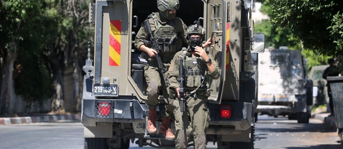 Israeli army deployed in the streets of Nablus during a military operation in the city, July 12, 2026. (Photo: Mohammed Nasser/APA Images)