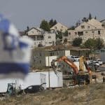 Israeli settlers continue expanding an outpost in the village of Umm al-Khair in the Masafer Yatta community, south of Hebron, May 20, 2026. (Photo: Mamoun Wazwaz/APA Images)