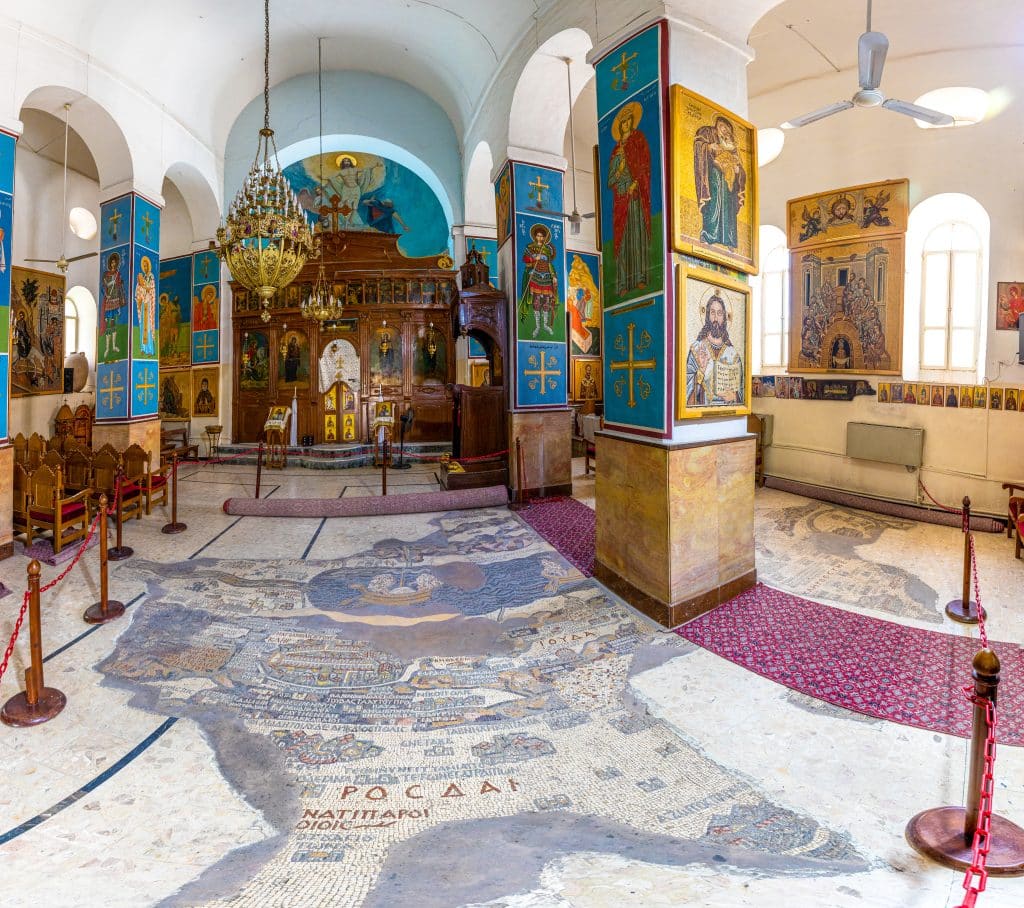 The interior of the Church of St. George, Madaba, Jordan. Part of the floor is the remains of a mid-6th century mosaic map of the Levant.