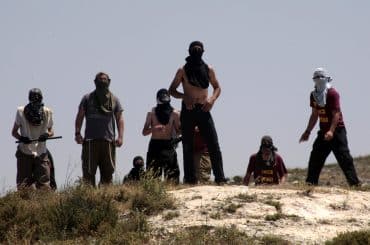 Settlers attack the Palestinian village of Urif, outside of Nablus, April 30, 2013. (Photo: Nedal Eshtayah/APA Images)