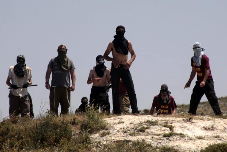 Settlers attack the Palestinian village of Urif, outside of Nablus, April 30, 2013. (Photo: Nedal Eshtayah/APA Images)