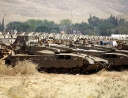 Israeli military vehicles on Palestinian agricultural land in the Jordan valley, near the West Bank town of Tubas, May 6, 2015. (Photo: Shadi Hatem/APA Images)