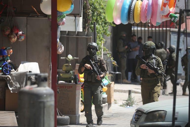 Israeli forces carry out a military raid in the Askar refugee camp, east of the West Bank city of Nablus, on August 6, 2026. The raid began just hours after the Qalandia refugee camp raid in the Ramallah area on August 5. (Photo by Mohammed Nasser /apaimages)