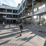 Displaced children play football in the courtyard of an UNRWA school in al-Bureij refugee camp in the central Gaza Strip on June 13, 2026. (Photo: Moiz Salhi/APA Images)