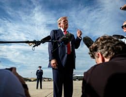 President Donald J. Trump speaks with members of the press before boarding Air Force One at Joint Base Andrews, Maryland, Friday, August 21, 2026. (Photo: White House/Flickr, by Molly Riley)