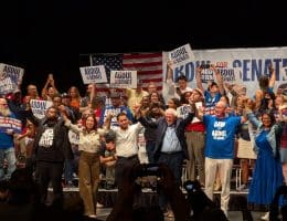 Michigan state Rep. Donavan McKinney (left) and Michigan Democratic Senate candidate Abdul El-Sayed (center) are joined by Rep. Alexandria Ocasio-Cortez, Sen. Bernie Sanders, UAW President Shawn Fain, and Rep. Rashida Tlaib at a rally in Detroit on July 20, 2026. (Photo: x.com/DonavanMI13)