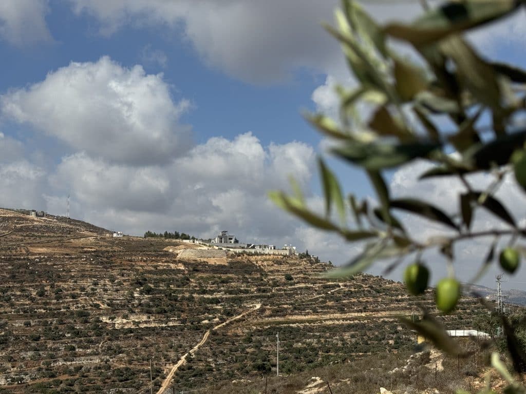 Several families have been besieged in their homes by Israeli settlers on the Ras al-Ain hill outside the village of Qusra, south of Nablus in the central West Bank, August 2026. (Photo: Shatha Hammad)