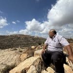 Abdul Karim Hassan, whose family is besieged on the Ras al-Ain hill outside the village of Qusra, south of Nablus in the central West Bank, August 2026. (Photo: Shatha Hammad)