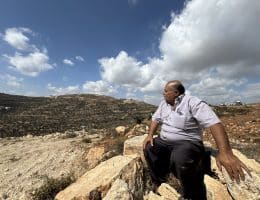 Abdul Karim Hassan, whose family is besieged on the Ras al-Ain hill outside the village of Qusra, south of Nablus in the central West Bank, August 2026. (Photo: Shatha Hammad)