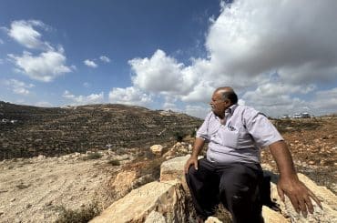 Abdul Karim Hassan, whose family is besieged on the Ras al-Ain hill outside the village of Qusra, south of Nablus in the central West Bank, August 2026. (Photo: Shatha Hammad)