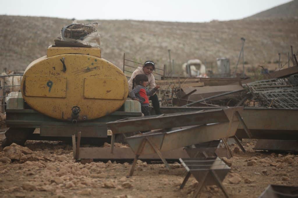 Israeli forces demolish Palestinian Bedouin homes on the grounds of unlicensed construction in the village of Khirbet al-Ras al-Ahmar, north of the Jordan Valley in the West Bank, on April 4, 2025. (Photo: Mohammed Nasser/APA Images)