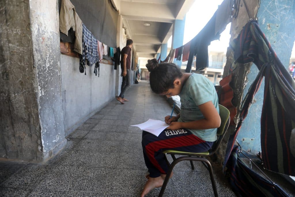 Displaced Palestinian families prepare for the start of the new school year in Gaza City on September 12, 2026. (Photo: Bilal Osama/APA Images)