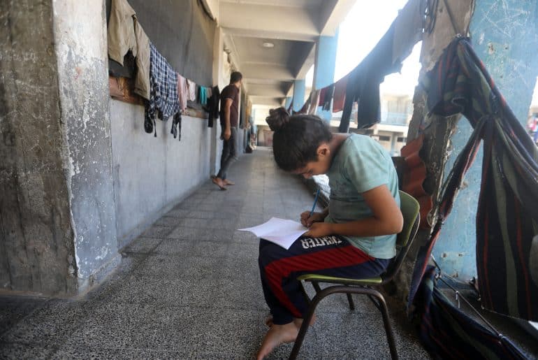 Displaced Palestinian families prepare for the start of the new school year in Gaza City on September 12, 2026. (Photo: Bilal Osama/APA Images)