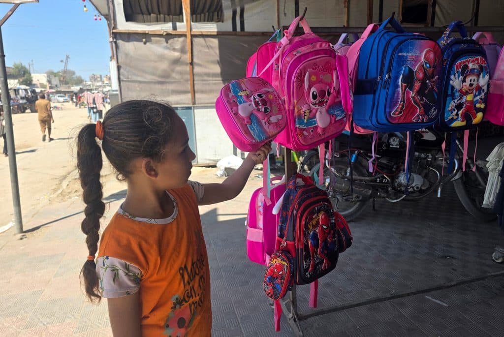 Palestinians shop for school supplies from stalls in the Khan Younis open market in the southern Gaza Strip, September 13, 2026, ahead of the start of the new school year. (Photo: Tariq Mohammad/APA Images)